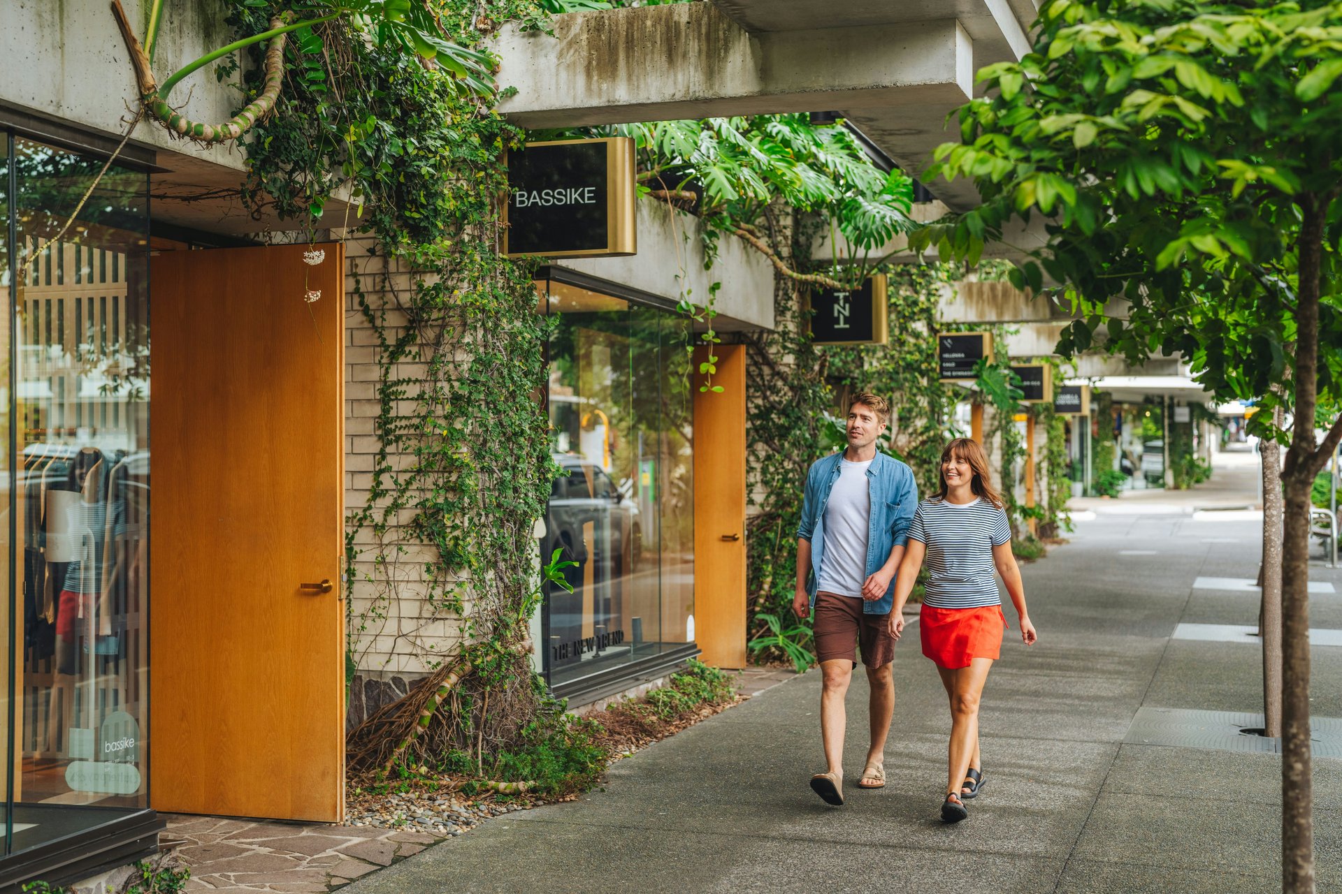 Travellers exploring a green city neighbourhood
