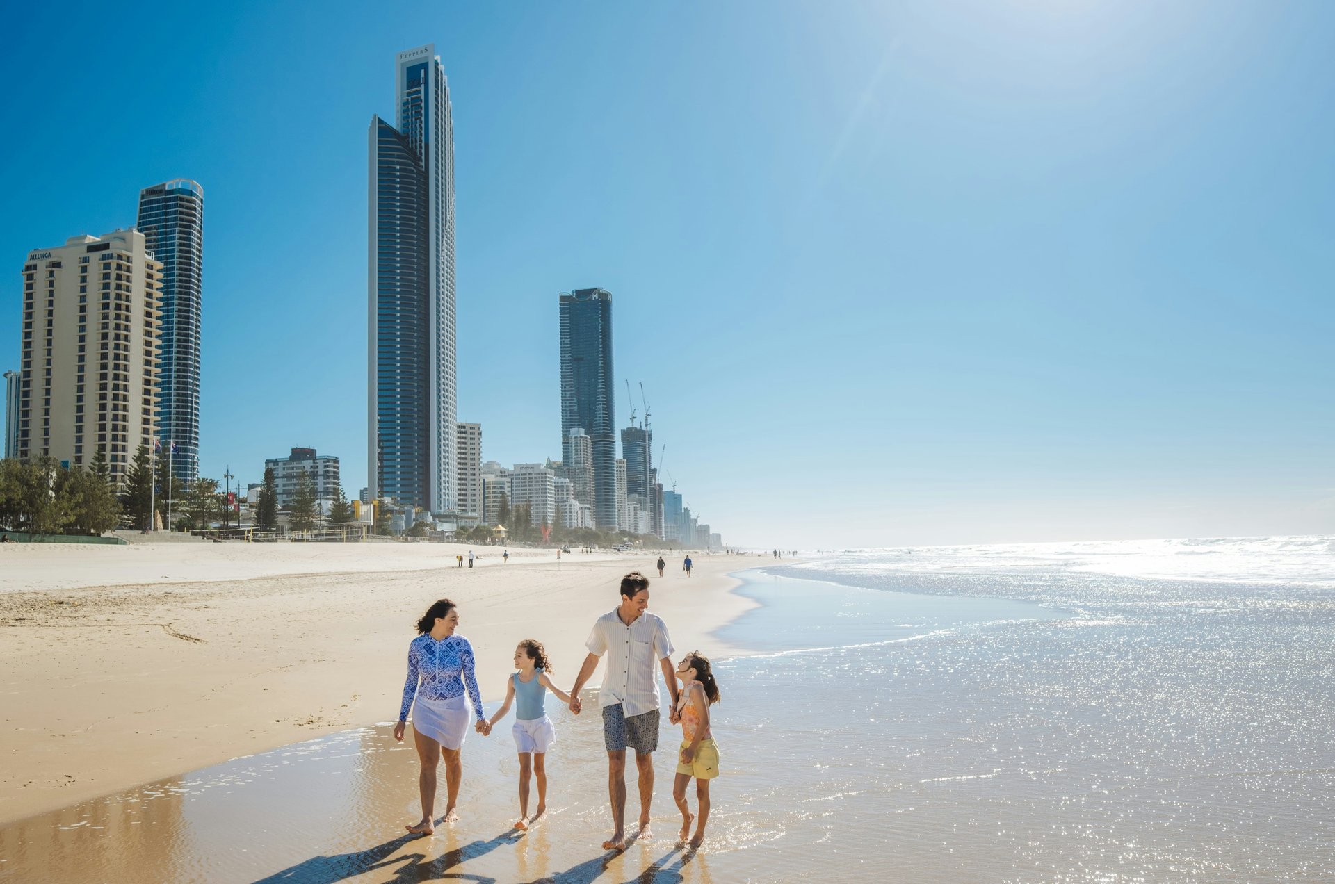 Gold Coast towers beside a wide sandy beach